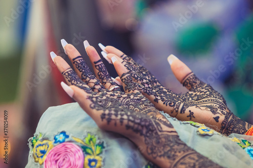 Indian Hindu bride's wedding henna mehendi menhdi hands close up