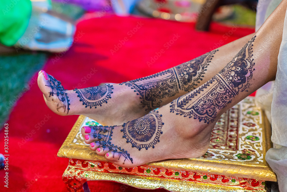 Indian Hindu bride's wedding henna mehendi menhdi feet close up