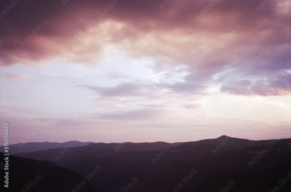 Panoramic view of the rocks at sunset near Belogradchik fortress in Bulgaria. Real grain scanned film. Panoramic view of the rocks at sunset near Belogradchik fortress in Bulgaria. Real grain scanned film.
