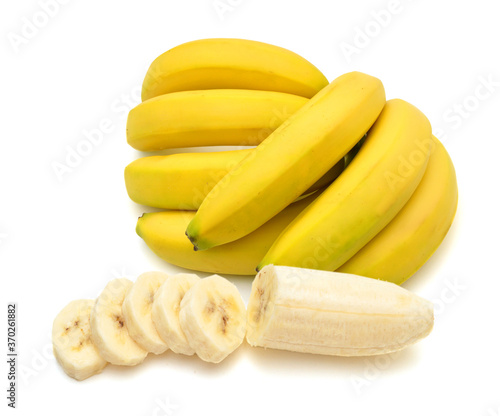 Bunch of bananas and slice on white background