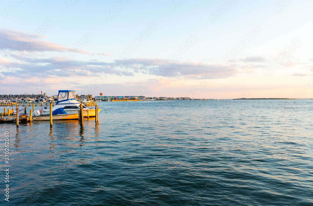 Obraz premium Scenic boats in the harbor of Long Beach Island popular vacation and beach house destination off the Jersey Shore
