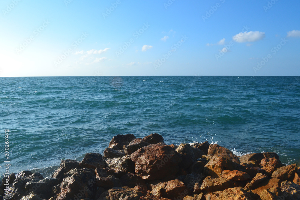Sea and rocks on a sunny day Sea and rocks on a sunny day