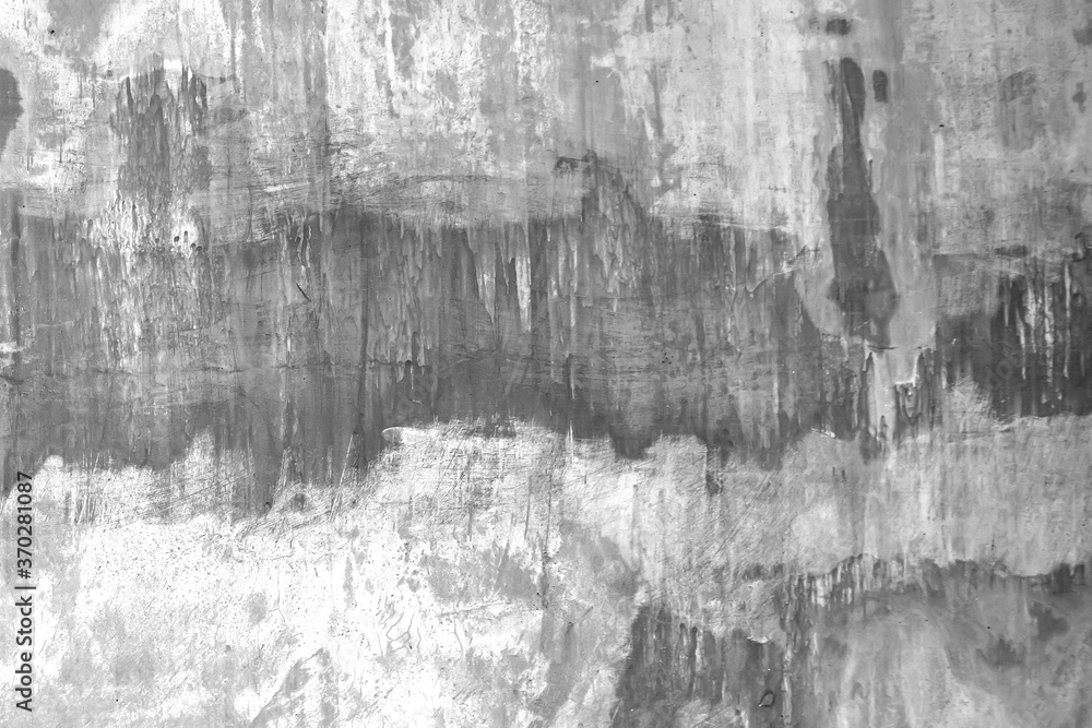 Raw old cement or concrete or plaster wall with stains and cracks for background and texture. Raw old cement or concrete or plaster wall with stains and cracks for background and texture.