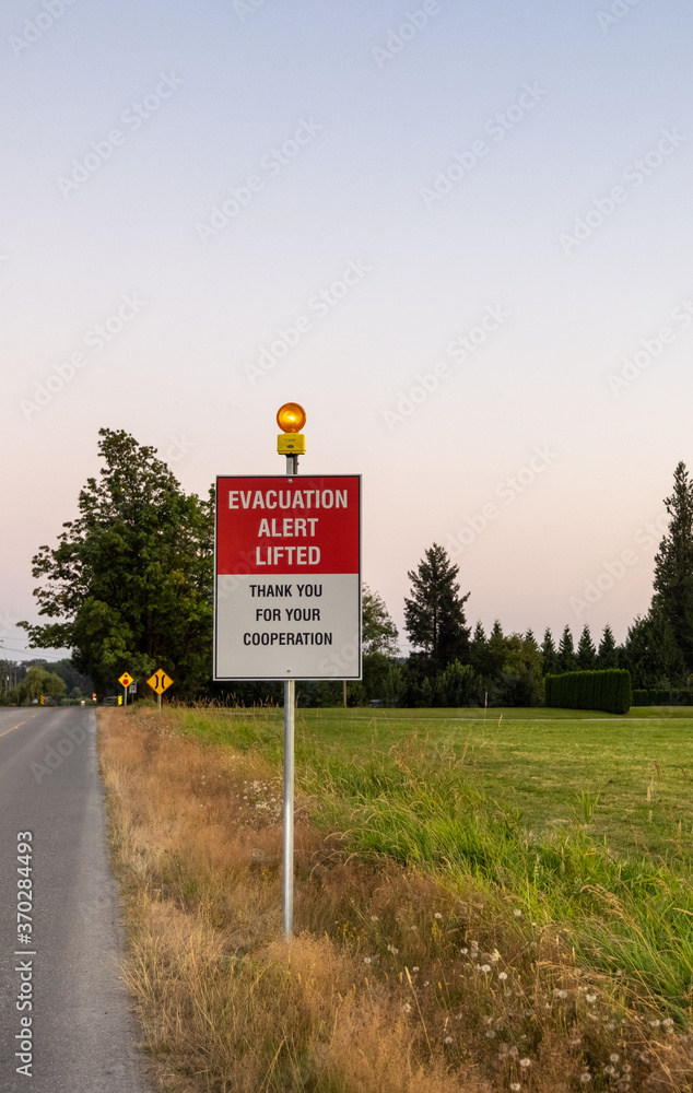Flooding Over Evacuation Alert Signage