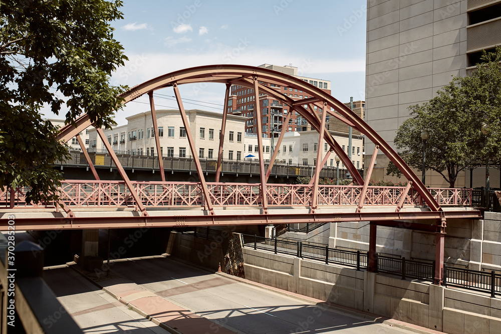 Fototapeta premium Pedestrian bridge over street in Downtown Denver. Denver, Colorado, USA
