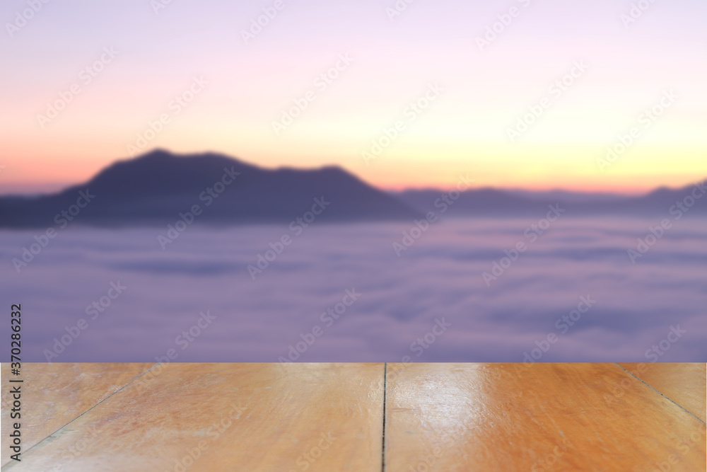 shelf floor with light mist in morning sunrise on the mountain for the background.