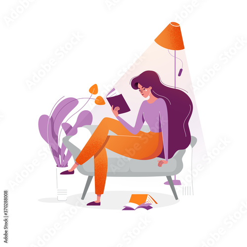 Young woman reads a book on couch at cozy home. The girl sitting on the sofa, reading a book and resting. Female daily lifestyle vector illustration. Character in modern flat art style for your design