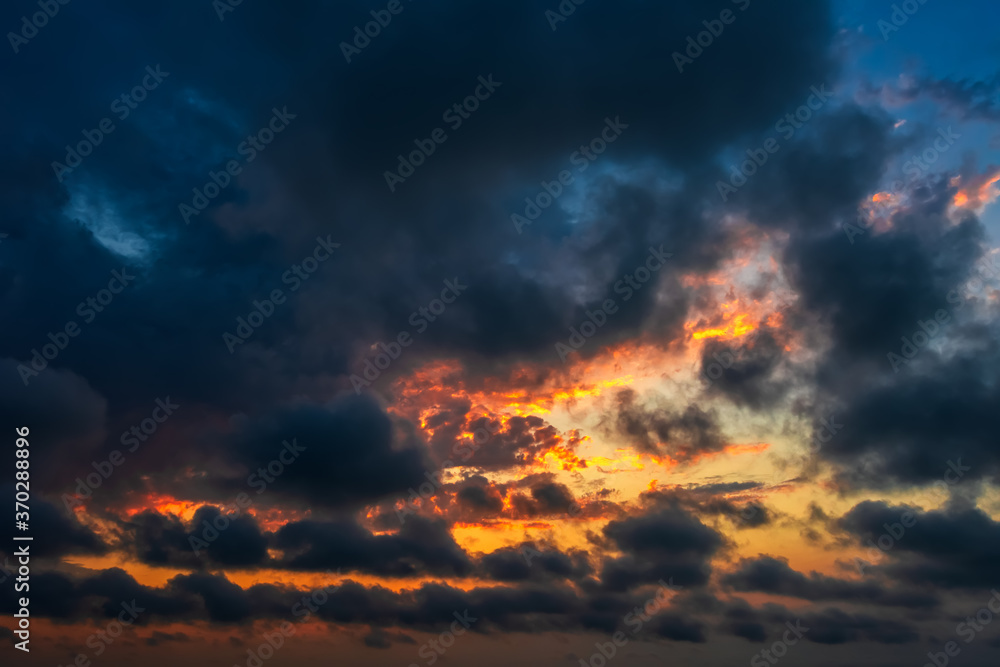 Colorful dramatic sunset cloudy sky
