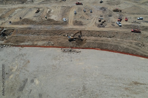 Aerial View looking down over Caterpillar Construction Excavator