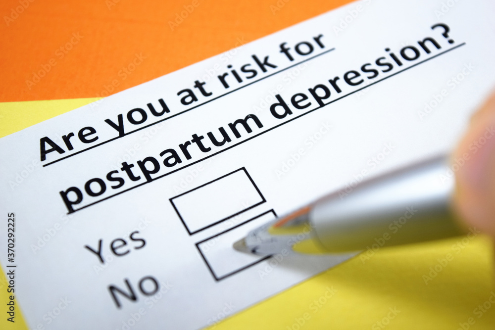 A person is answering question about postpartum depression. A person is answering question about postpartum depression.