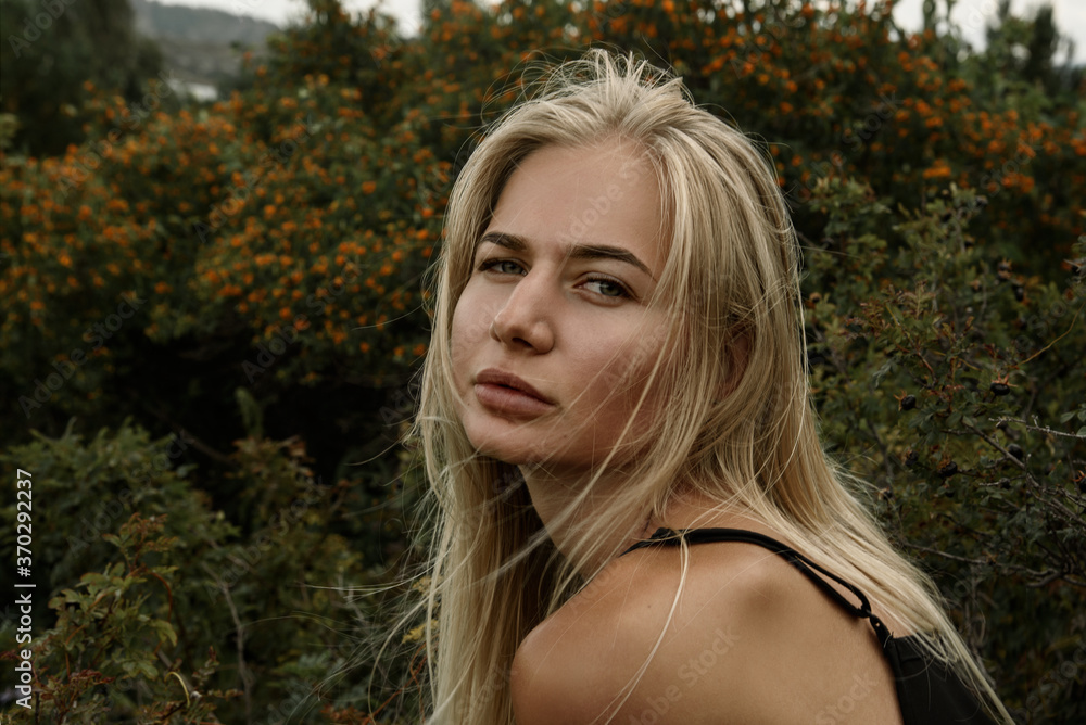 Naklejka premium Portrait of a girl close-up