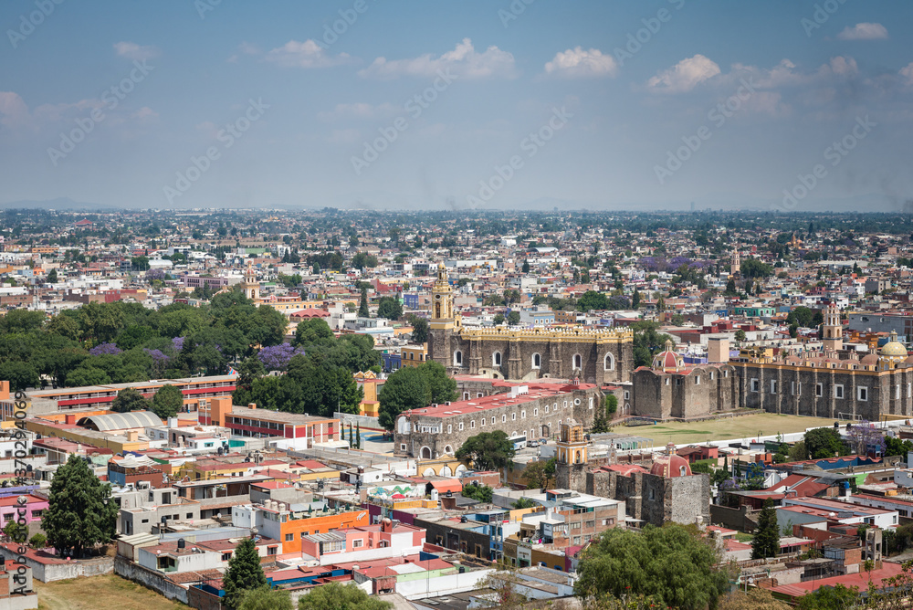 View of rooftops of Puebla City, Mexico with blue sky