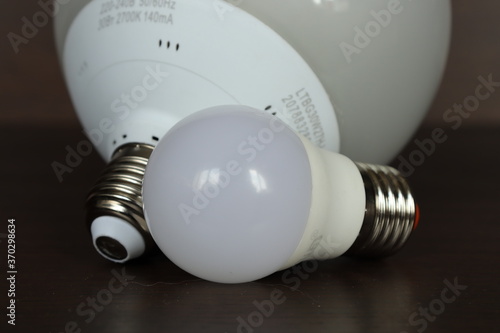 two frosted light bulbs close up