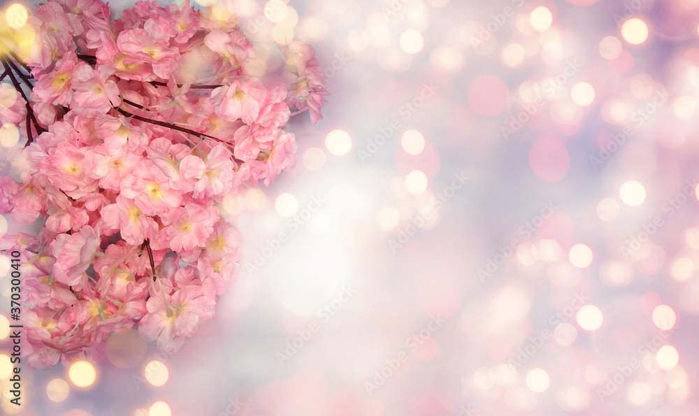 spring background flowering white sakura cherry flowers tree and abstract bokeh