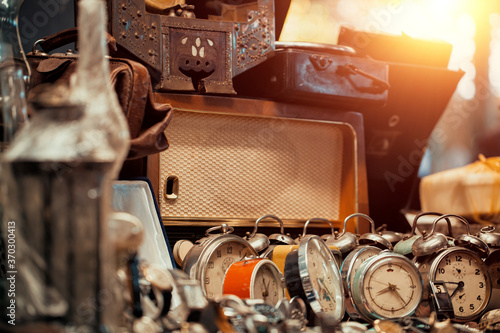 Fotografie old clocks at sunday flea market countertop