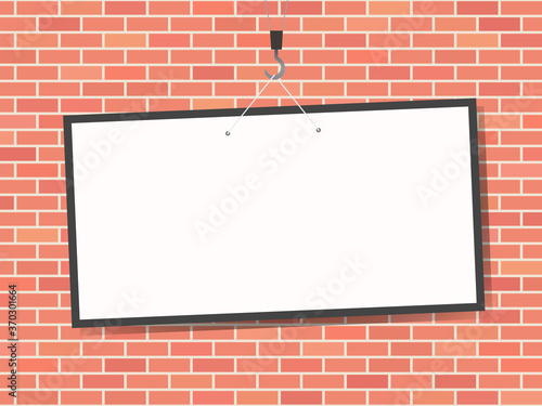 Blank billboard on brick wall 