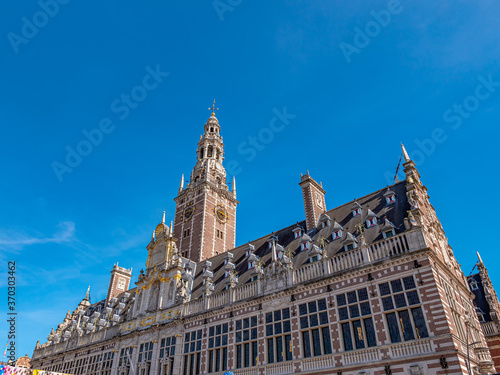 Cityscape of Leuven, Belgium with The University Library building in Ladeuzeplein on a sunny day photo