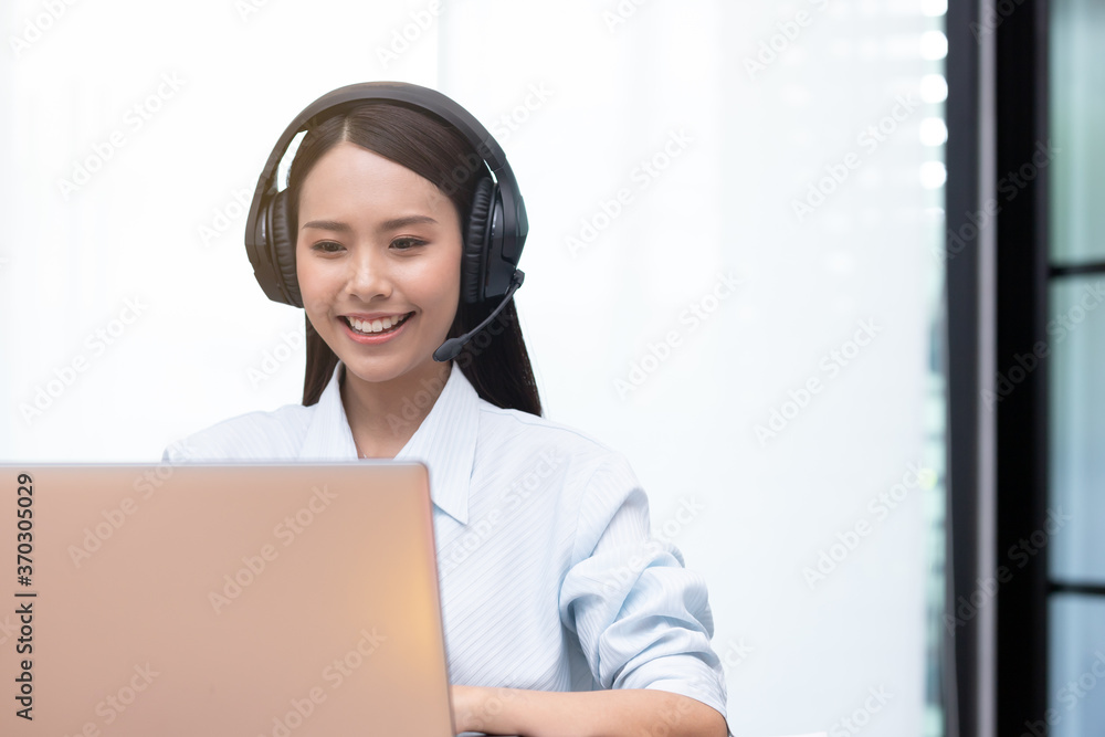 Business asian woman happy working job on laptop in office. Business asian woman happy working job on laptop in office.