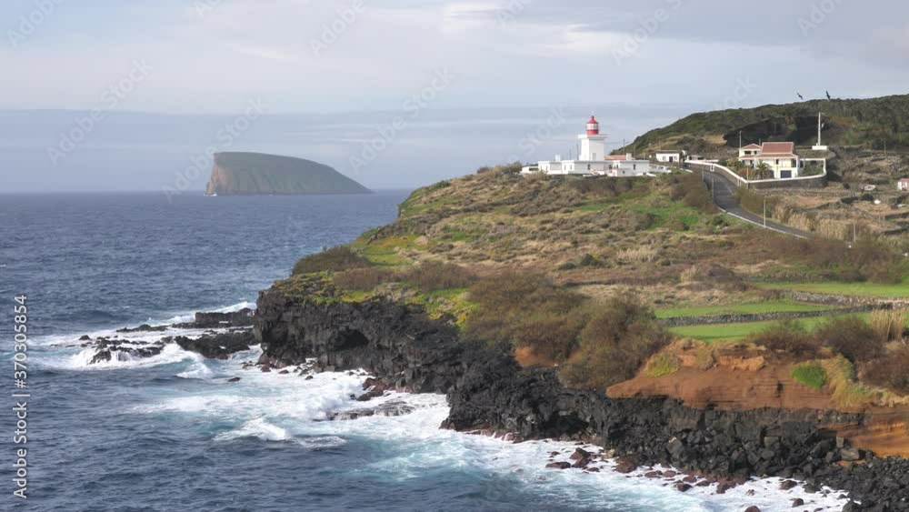 Beautiful Lighthouse Farol Das Contendas at Forte da Greta, Azores Beautiful Lighthouse Farol Das Contendas at Forte da Greta, Azores