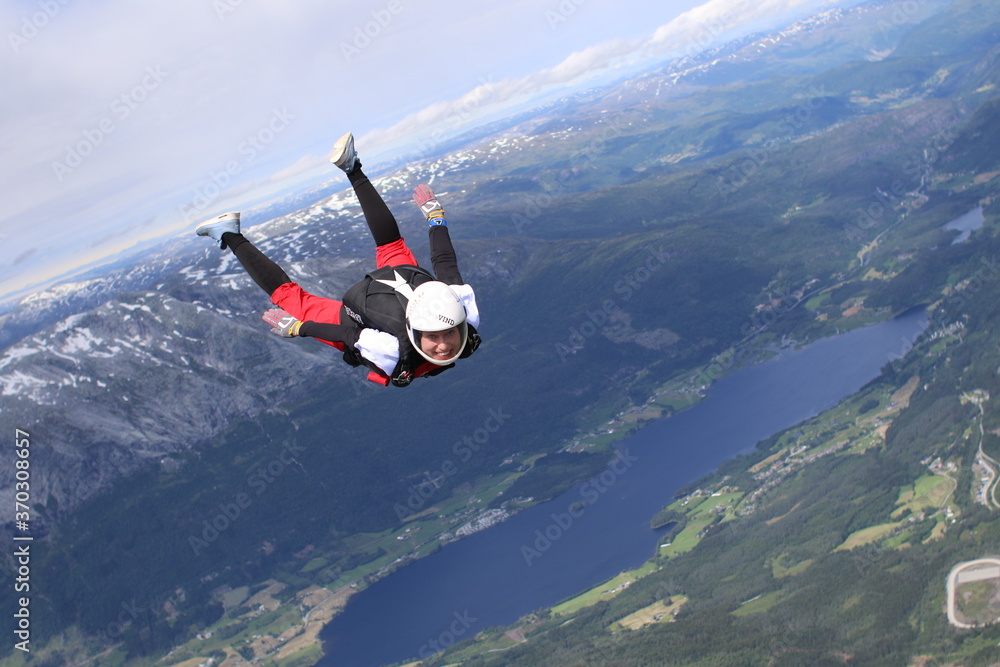 Skydivers over mountains in Norway Skydivers over mountains in Norway