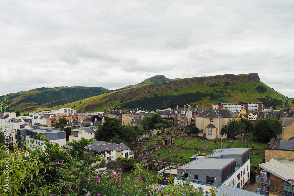 Edinburgh, Scotland - August 20, 2019, view of the old town and Mount Arthur's Seat