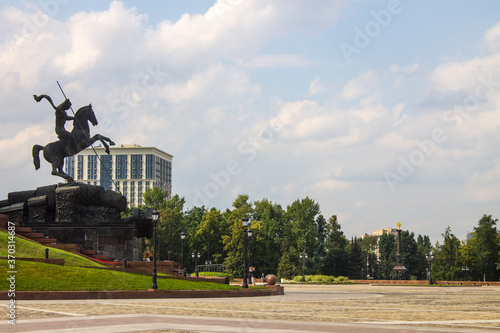 Monument to George the victorious on Poklonnaya hill in Victory Park in Moscow Russia and space for copying against a cloudy sky