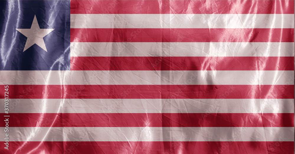 Fototapeta premium State flag fluttering in the wind. Colored background on textiles
