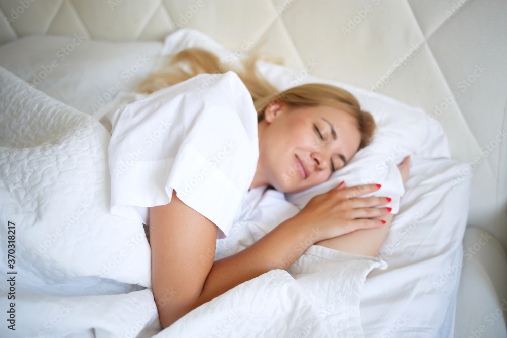 beautiful young woman sleeping on white bed beautiful young woman sleeping on white bed