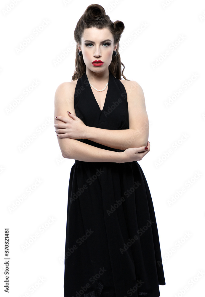 1940s woman wearing a black halter neck dress 1940s woman wearing a black halter neck dress