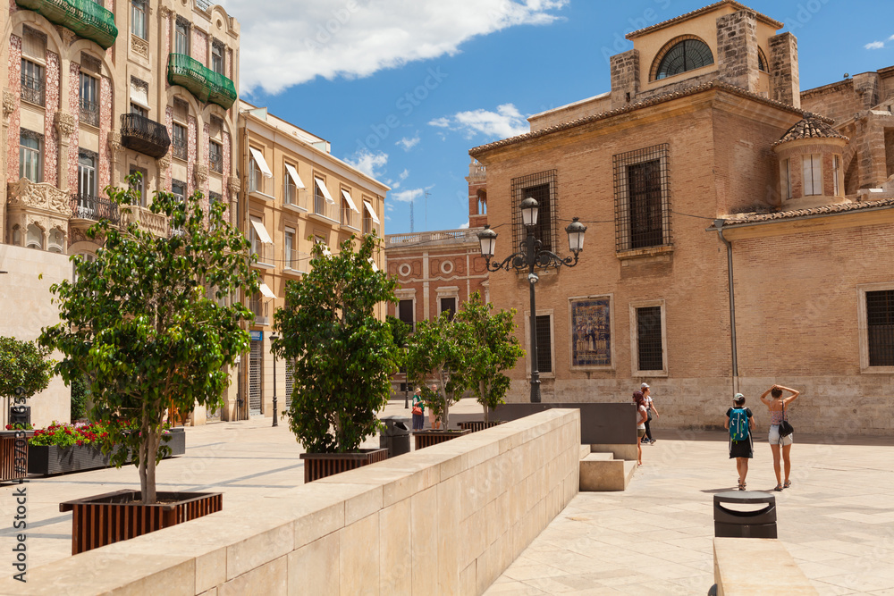 Obraz premium Tenements at the Plaza de la Reina, square in the center of Valencia, Spain.