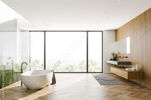 Wooden panoramic bathroom with tub and sink