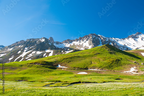 France, Savoie, mountain pastures and glaciers at the col des saisies