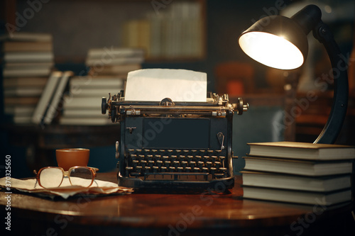 Vintage typewriter on wooden table in home office