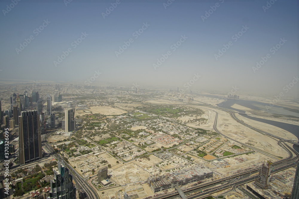 Tall buildings in the future city, Dubai. The picture from a hight