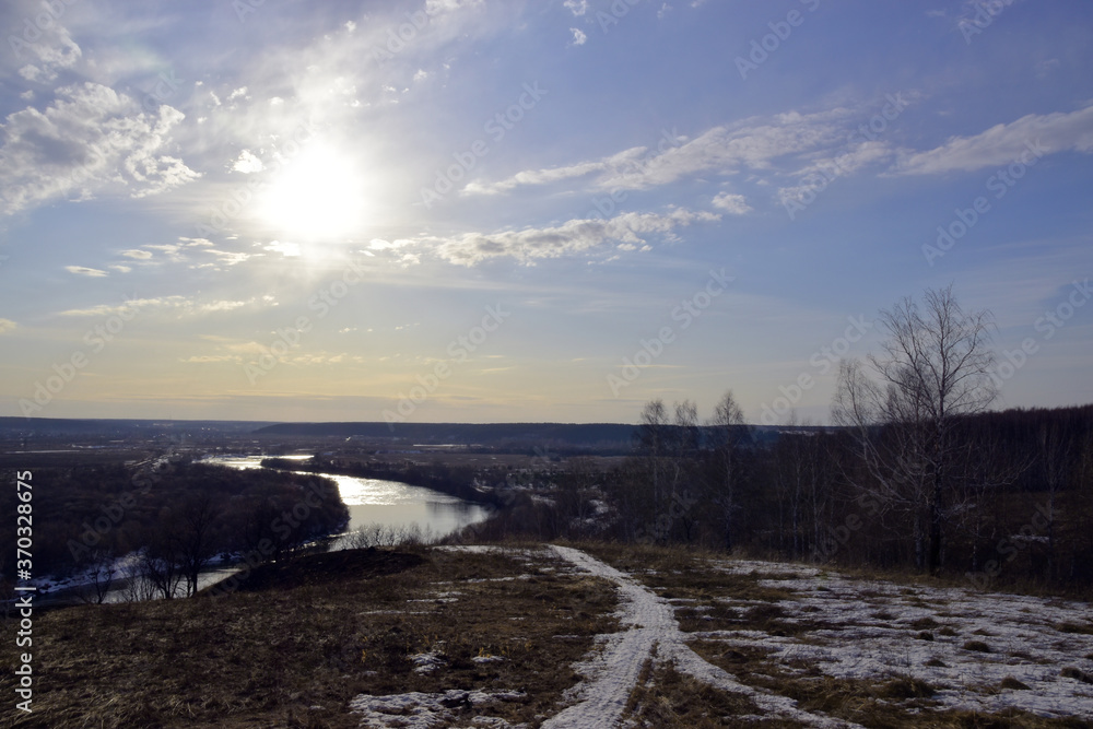 Obraz premium View from Spasskaya Mountain to the Sylva River Valley in the Kungursky District of Prikamye. A fine spring day in the Western Urals.