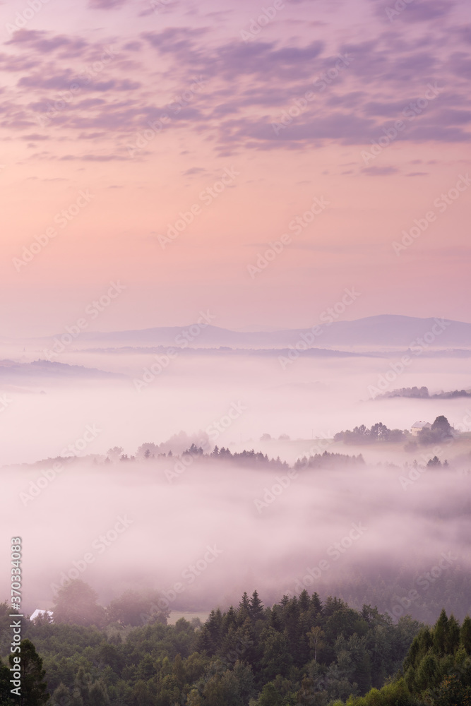 Pink Sunrise with Clouds and Fog at Rolling Hills