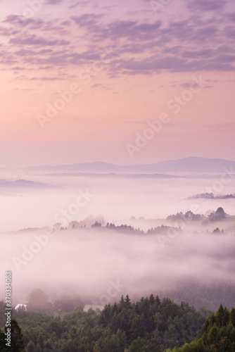 Pink Sunrise with Clouds and Fog at Rolling Hills