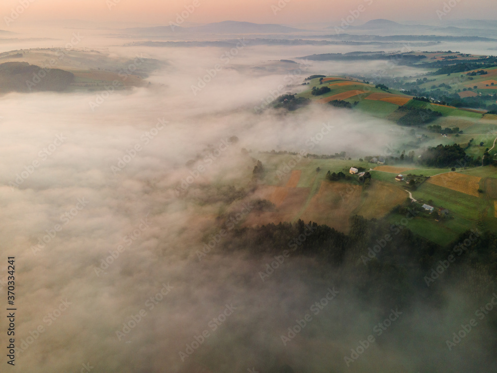 Fototapeta premium Drone View on Sunrise Above Polish Countryside in Mountains