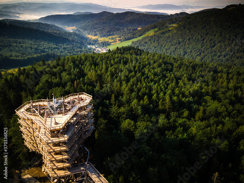 Fototapeta Naklejka Na Ścianę i Meble -  Slotwiny Arena Lookout Tower. Wooden Observation Tower in Lesser Poland.Drone View.