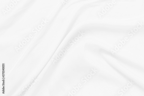 White cloth background soft wrinkled fabric patrem and surface. White colth soft background. White fabric wrinkles.