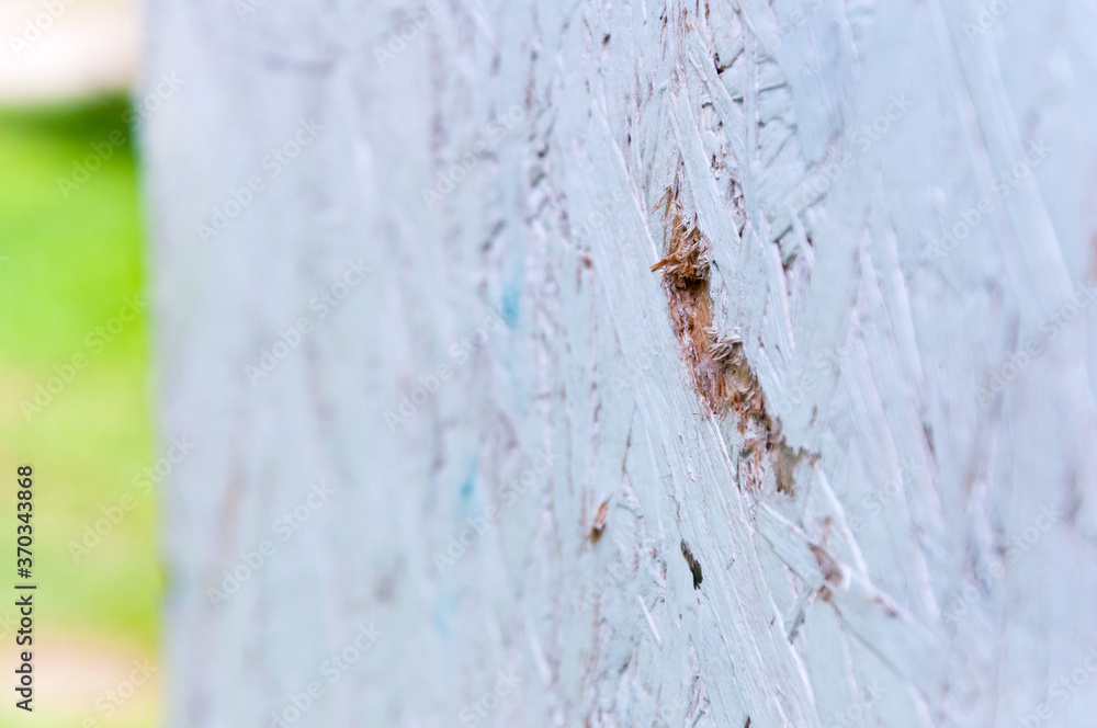 White wooden structural insulating panel with a hole. SIP texture background. Close up macro. White wooden structural insulating panel with a hole. SIP texture background. Close up macro.