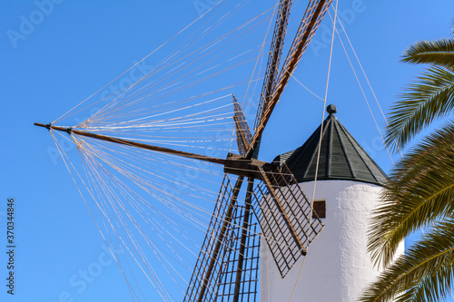 Traditional Spanish windmill in Ciutadella old town on Menorca. Baleares, Spain