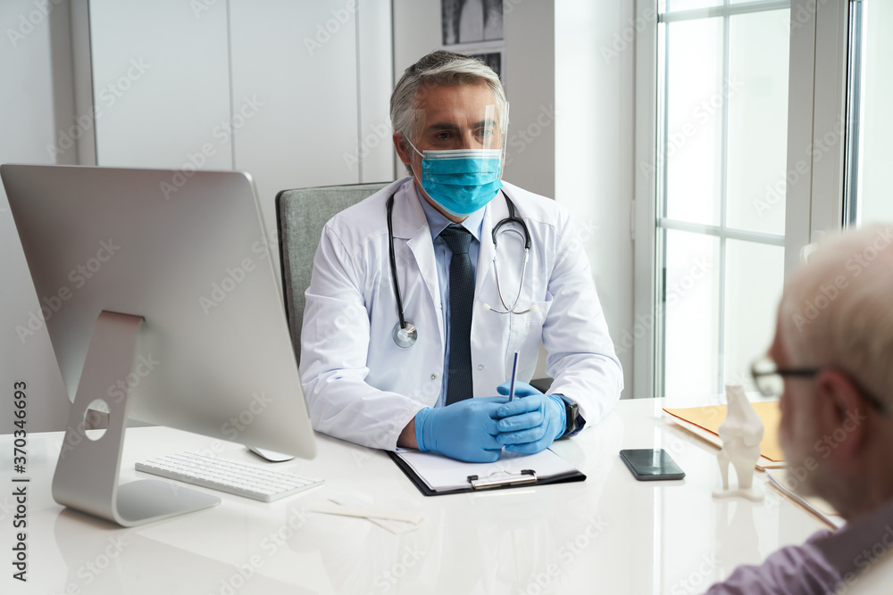 Protective masks and gloves are worn by all medical staff regardless Protective masks and gloves are worn by all medical staff regardless