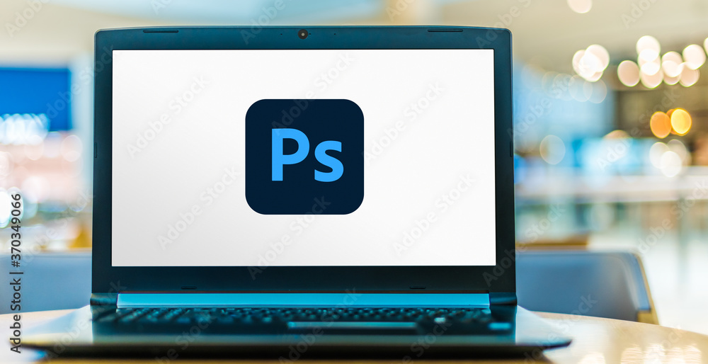 Laptop computer displaying logo of Adobe Photoshop Stock Photo | Adobe ...