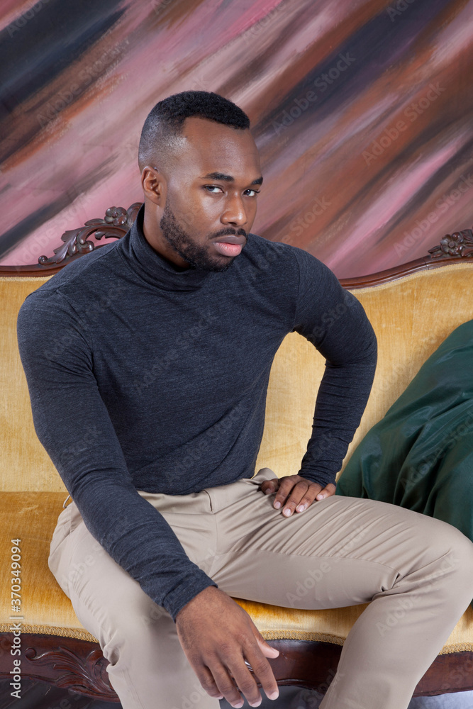Handsome Black man relaxing thoughtfully Handsome Black man relaxing thoughtfully
