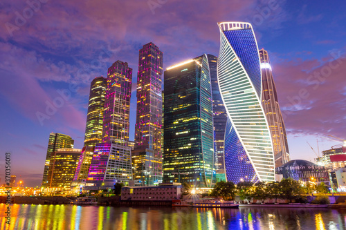 Moscow-city skyline panorama at night with colorful lights reflections on the surface of the river Moskva. Modern skyscrapers for business and life © Igor Shaposhnikov