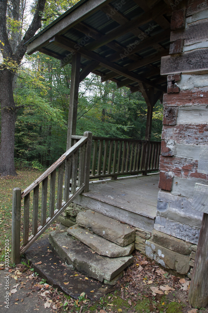 Steps and porch to a log cabin