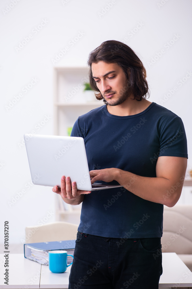 Young man employee working from house Young man employee working from house