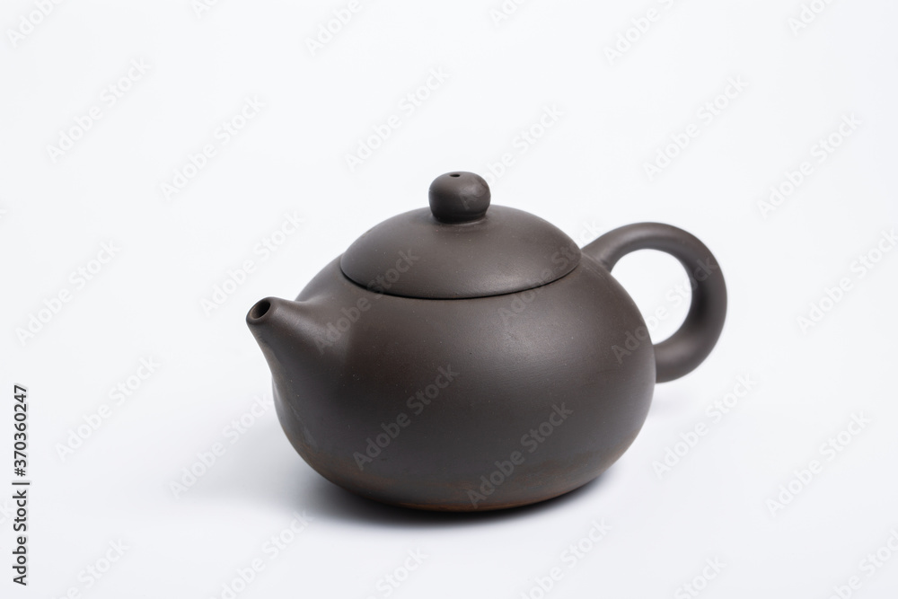 Chinese traditional teapot, cup, tea set covered with tea stains Chinese traditional teapot, cup, tea set covered with tea stains