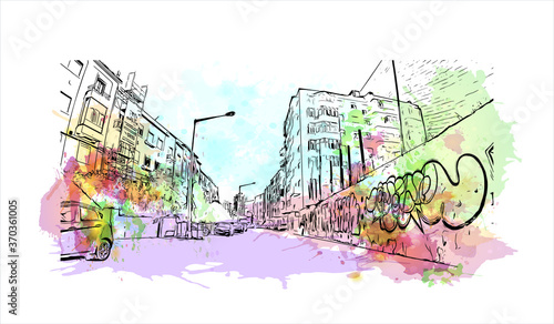 Building view with landmark of Almada is a city and a municipality in Portugal. Watercolor splash with hand drawn sketch illustration in vector.